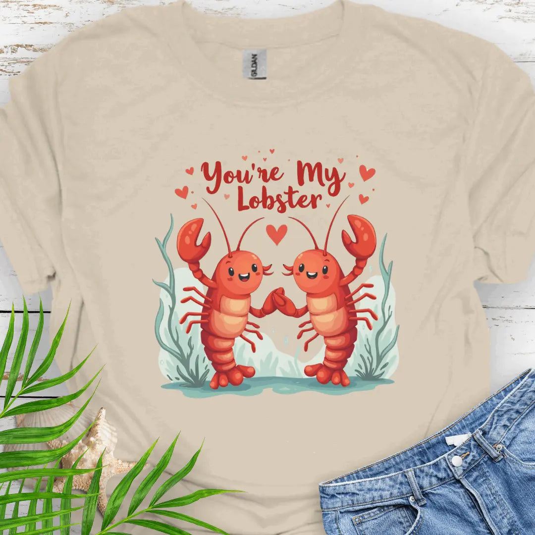 Natural softstyle unisex T-shirt featuring two lobsters holding hands with the text 'You're My Lobster' – a fun and quirky design for couples or lobster lovers.