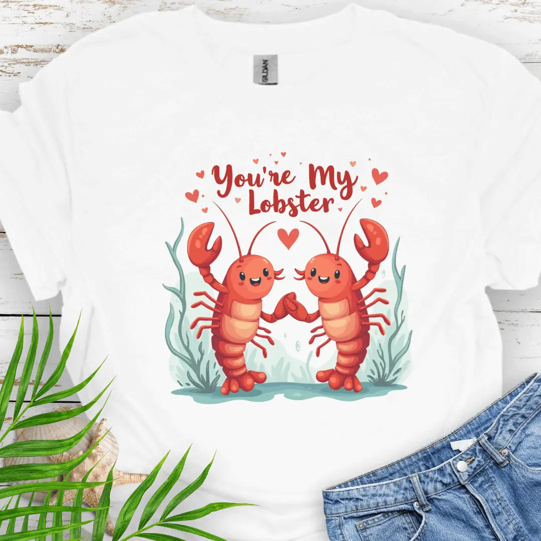 White softstyle unisex T-shirt featuring two lobsters holding hands with the text 'You're My Lobster' – a fun and quirky design for couples or lobster lovers.
