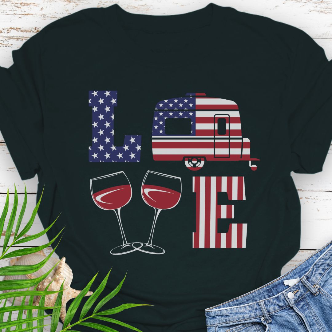Black patriotic LOVE t-shirt design with stars-and-stripes letters, camper, and wine glasses for American-themed camping and wine lovers.