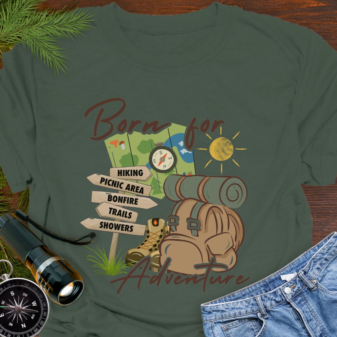 Military Green T-shirt perfect for hikers with a backpack with sleeping bag roll, hiking boots, trail sign, map and sun that says Born for adventure.