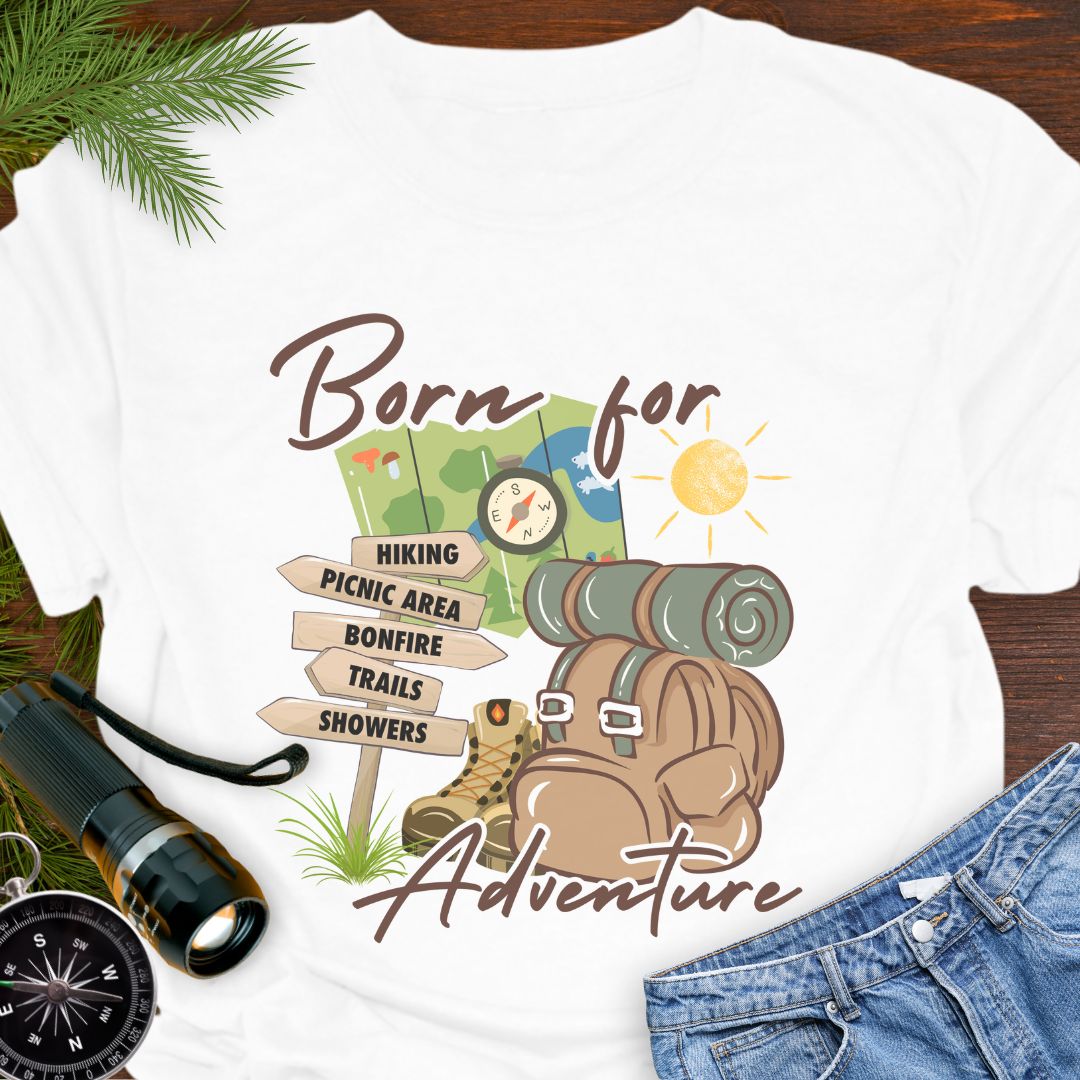White T-shirt perfect for hikers with a backpack with sleeping bag roll, hiking boots, trail sign, map and sun that says Born for adventure.
