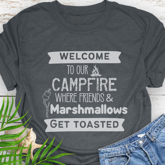 Dark Heather Funny “Welcome to Our Campfire Where Friends & Marshmallows Get Toasted” t-shirt with bold text design for campers and party lovers.