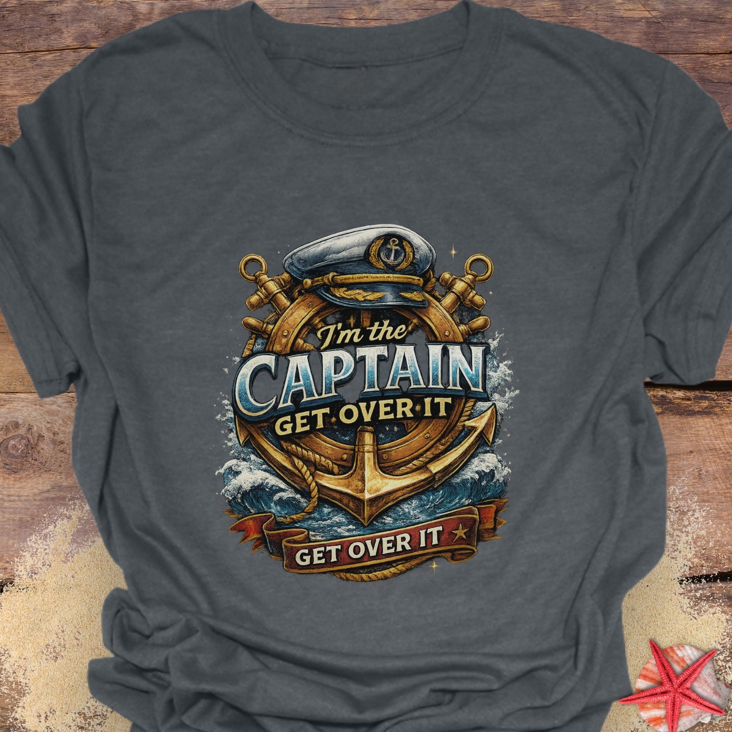 Dark Gray unisex t-shirt with nautical anchor and ship wheel graphic and text “I’m the Captain Get Over It”.
