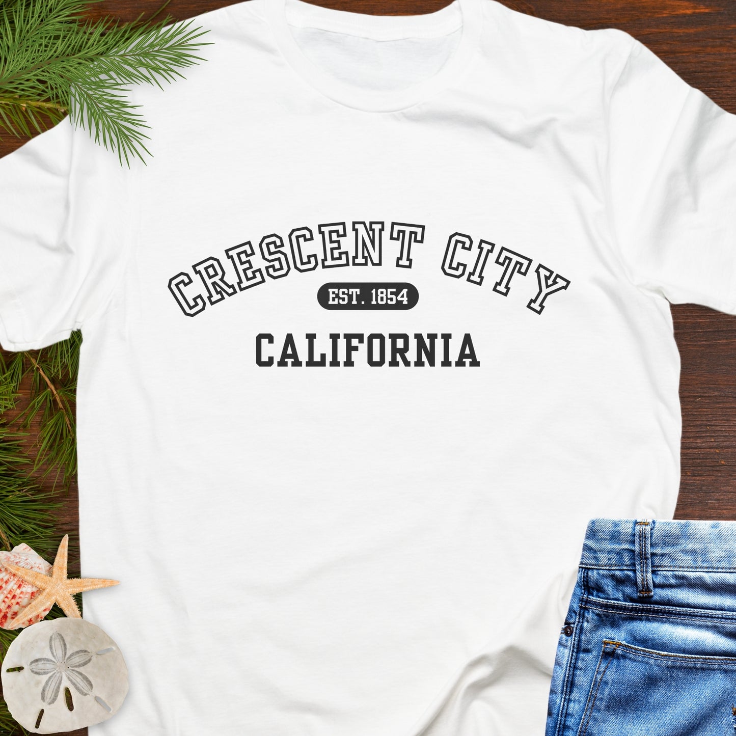 White t-shirt with 'Crescent City, California' Varsity text with Est. 1854.