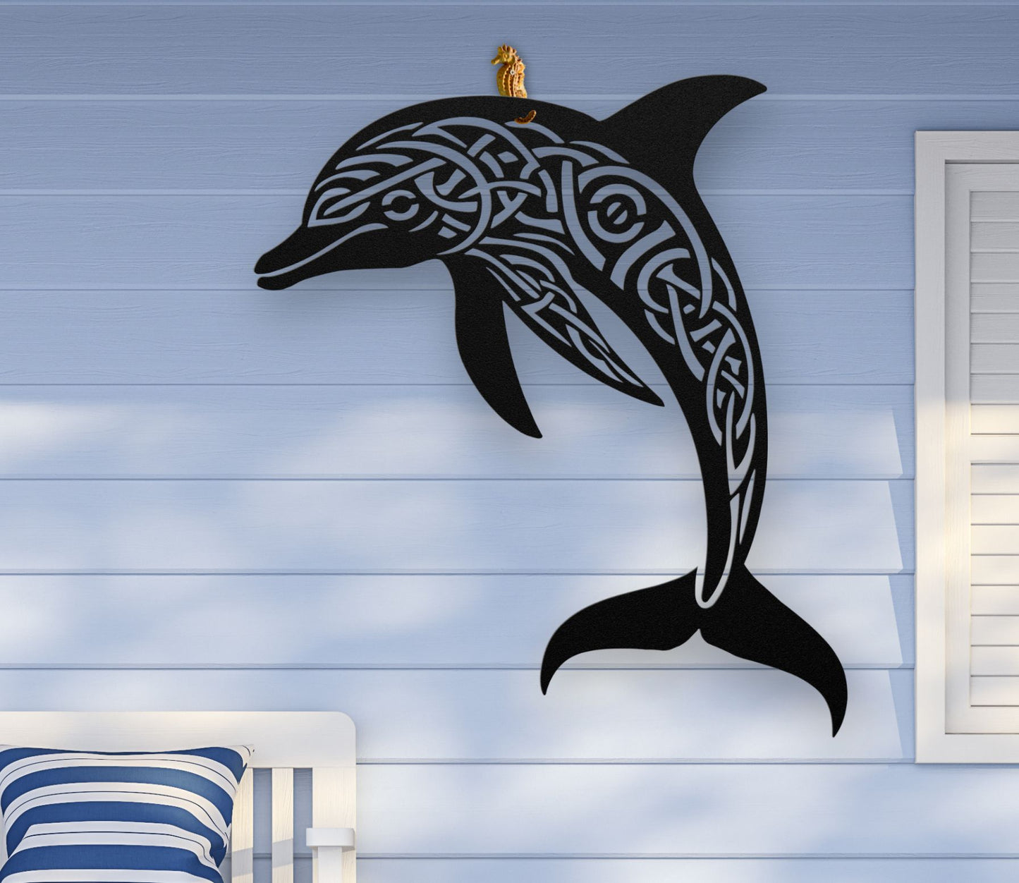 Black metal wall art featuring a dolphin silhouette with detailed Celtic knot design inside, crafted from steel and available in various sizes and colors.
