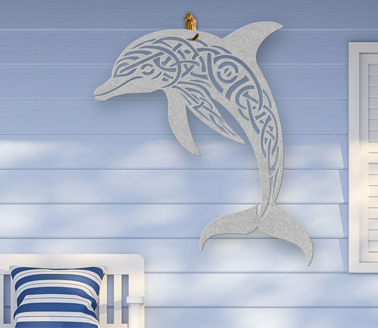 Silver metal wall art featuring a dolphin silhouette with detailed Celtic knot design inside, crafted from steel and available in various sizes and colors.
