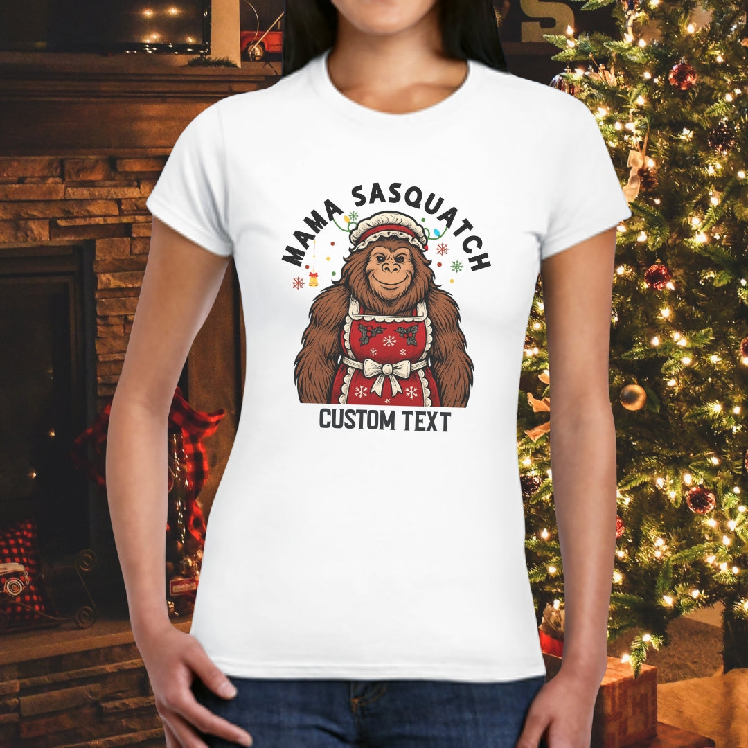 Person wearing a white t-shirt with 'Mama Sasquatch' graphic with custom text.