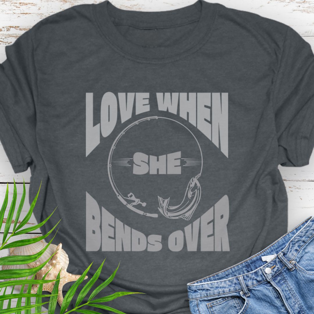 Dark Heather Gray T-shirt with a fishing pole bending over and the phrase “Love When She Bends Over” – humorous fishing design for anglers