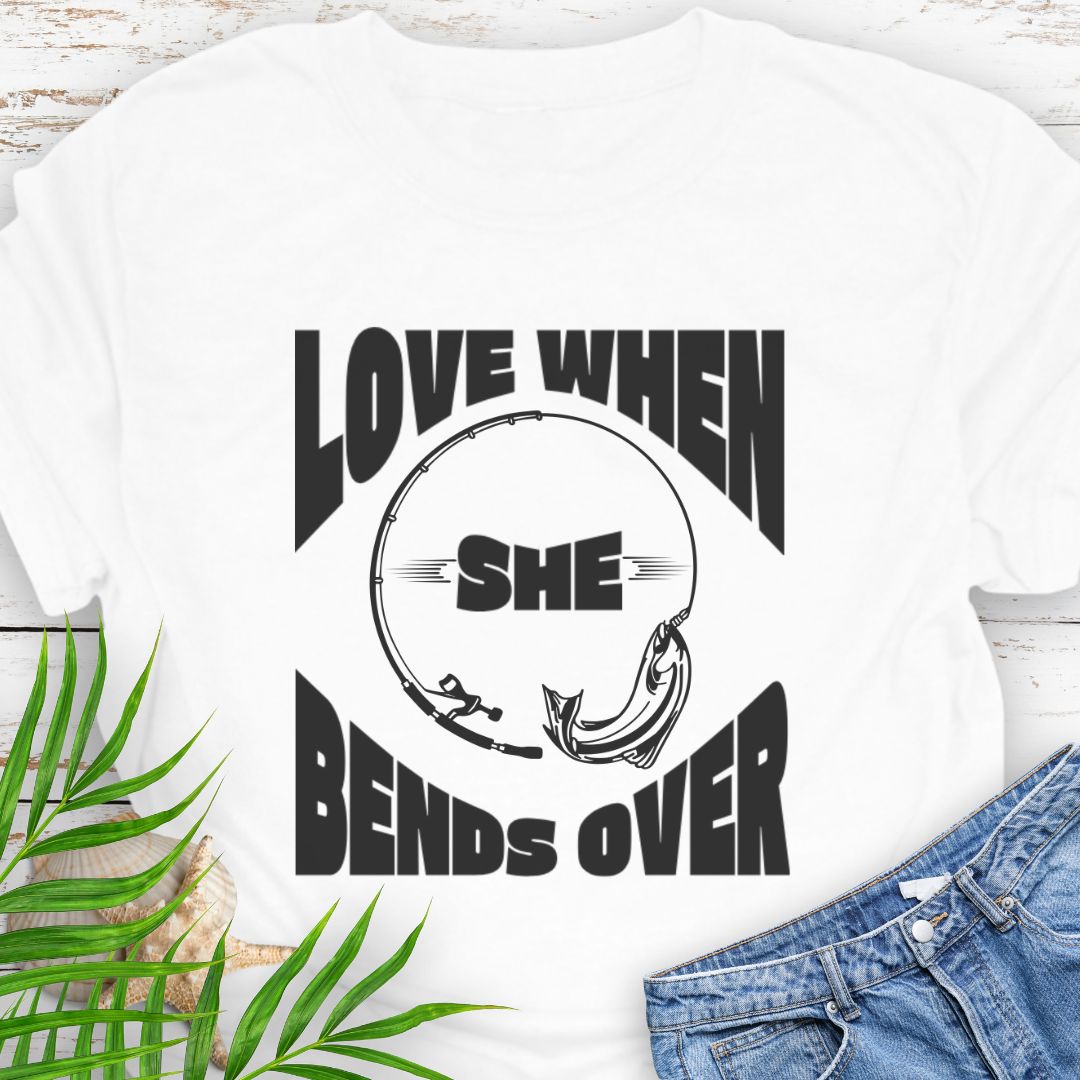 White T-shirt with a fishing pole bending over and the phrase “Love When She Bends Over” – humorous fishing design for anglers.