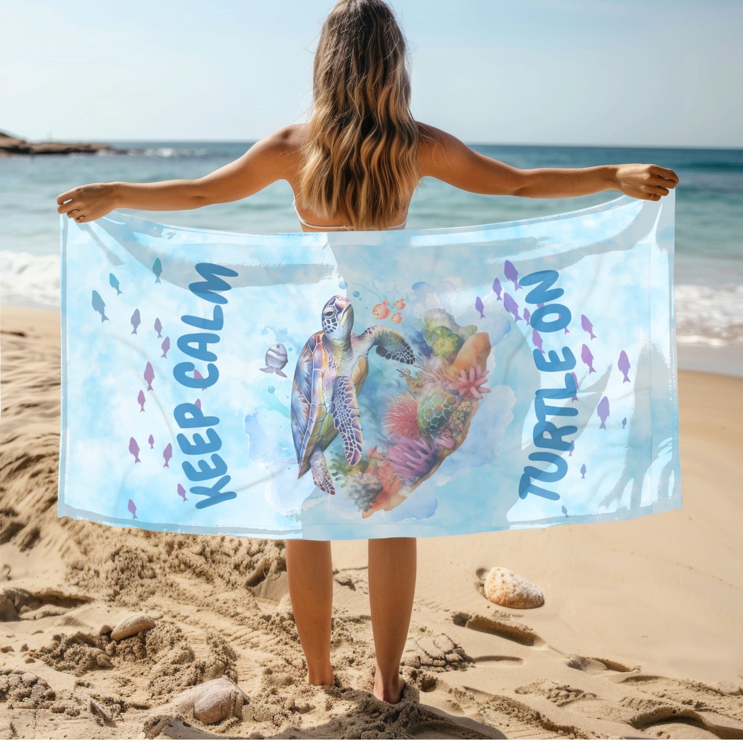 Light blue tie-dye beach towel with sea turtle and phrase “Stay Calm Turtle On”.