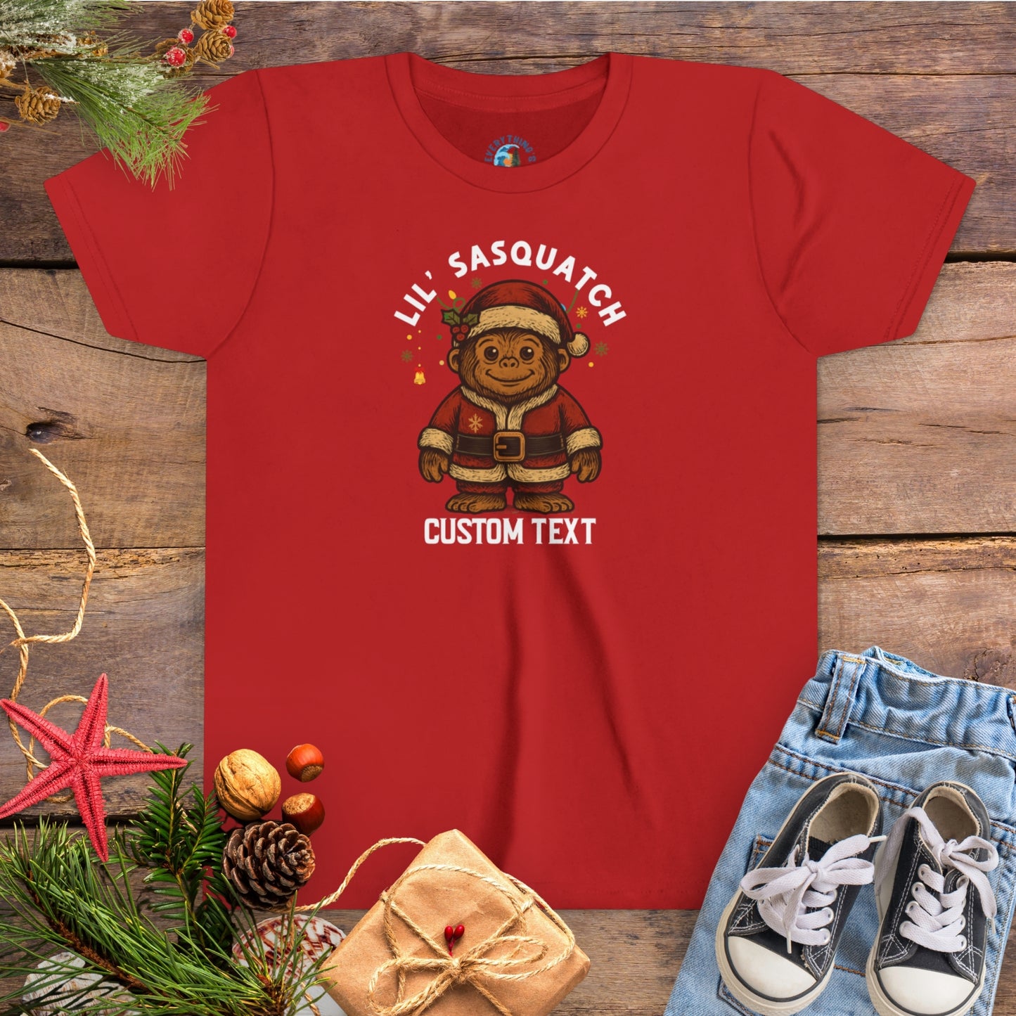 Red t-shirt with 'Lil' Sasquatch' custom text group family Christmas tee.