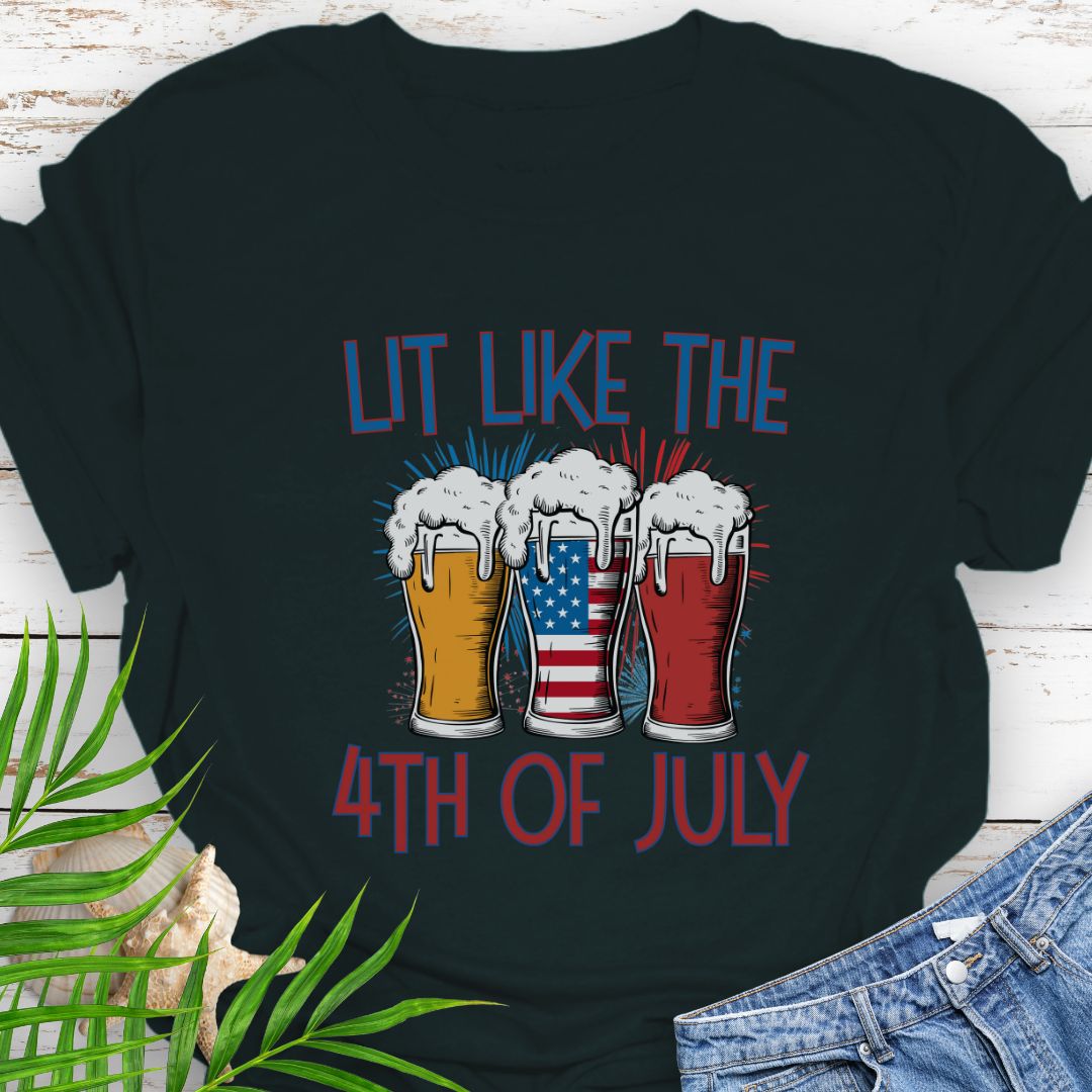 Black T-shirt graphic showing three pint glasses of beer with one filled by the American flag and the phrase "Lit Like the 4th of July" in bold lettering.