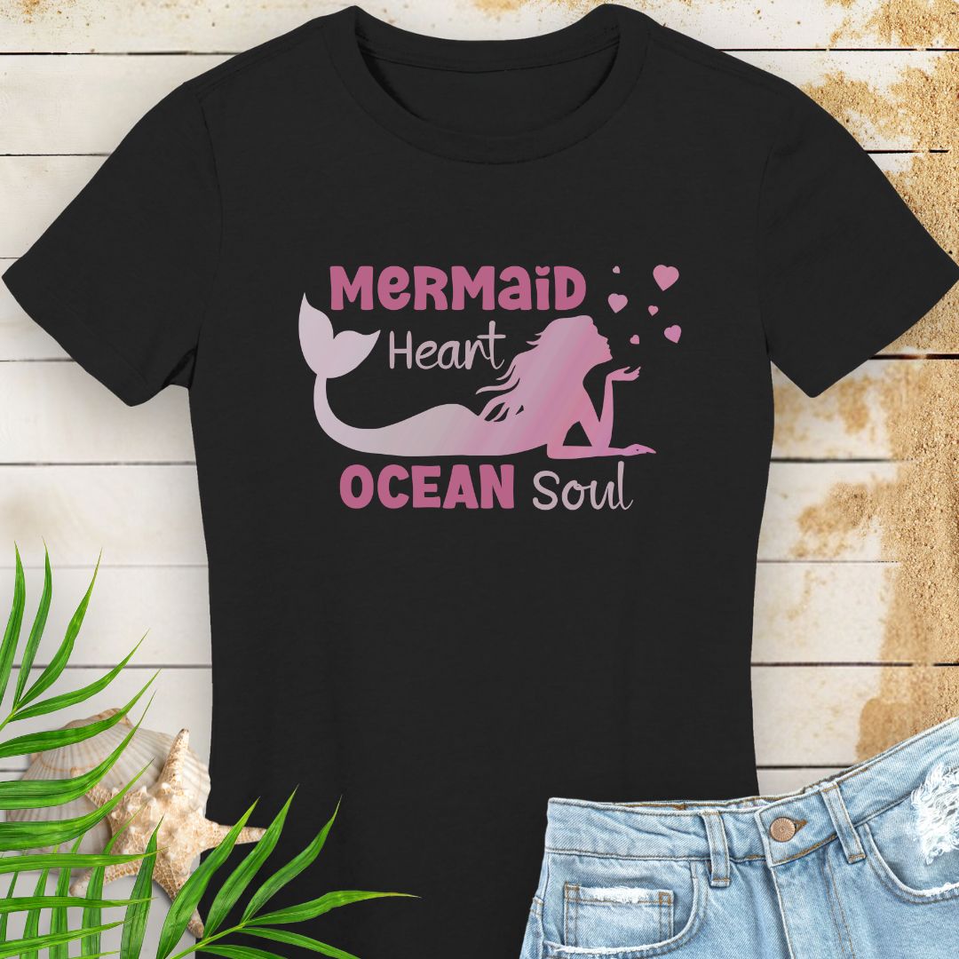 Black women's beachy t-shirt with a design of a mermaid blowing heart bubbles in gradient pink with the phrase Mermaid Heart Ocean Soul - for ocean lovers, perfect for summer vacations and dreamy coastal vibes.
