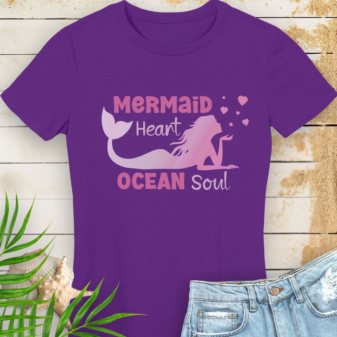 Purple women's beachy t-shirt with a design of a mermaid blowing heart bubbles in gradient pink with the phrase Mermaid Heart Ocean Soul - for ocean lovers, perfect for summer vacations and dreamy coastal vibes.