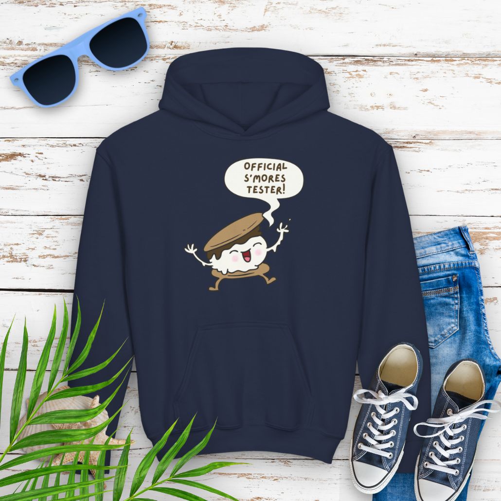 Navy Youth hoodie with "Official S’mores Tester" text in a speech bubble with cartoon s'more – fun camping-themed sweatshirt for kid.
