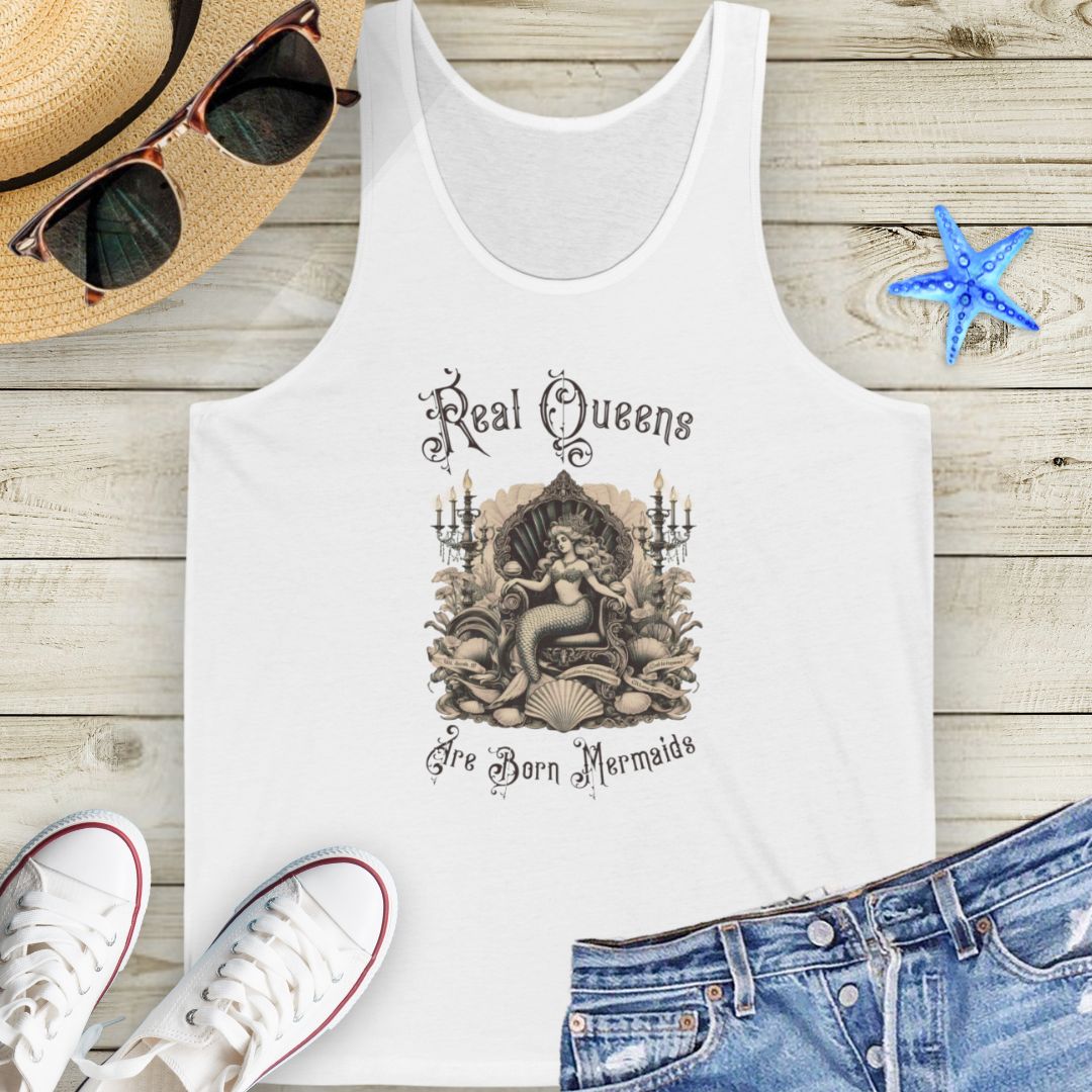 White Victorian-style mermaid sitting on a seashell throne with text “Real Queens Are Born Mermaids” on a soft unisex tank top.