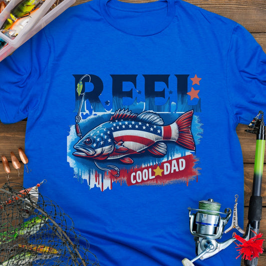 Royal Blue patriotic fishing T-shirt with red, white, and blue design and the phrase “Reel Cool Dad”.