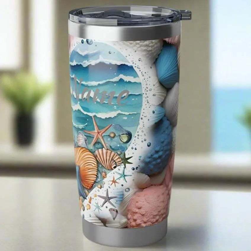 side view of 20 oz stainless steel tumbler with ocean wave heart on seashell background with personalized name.