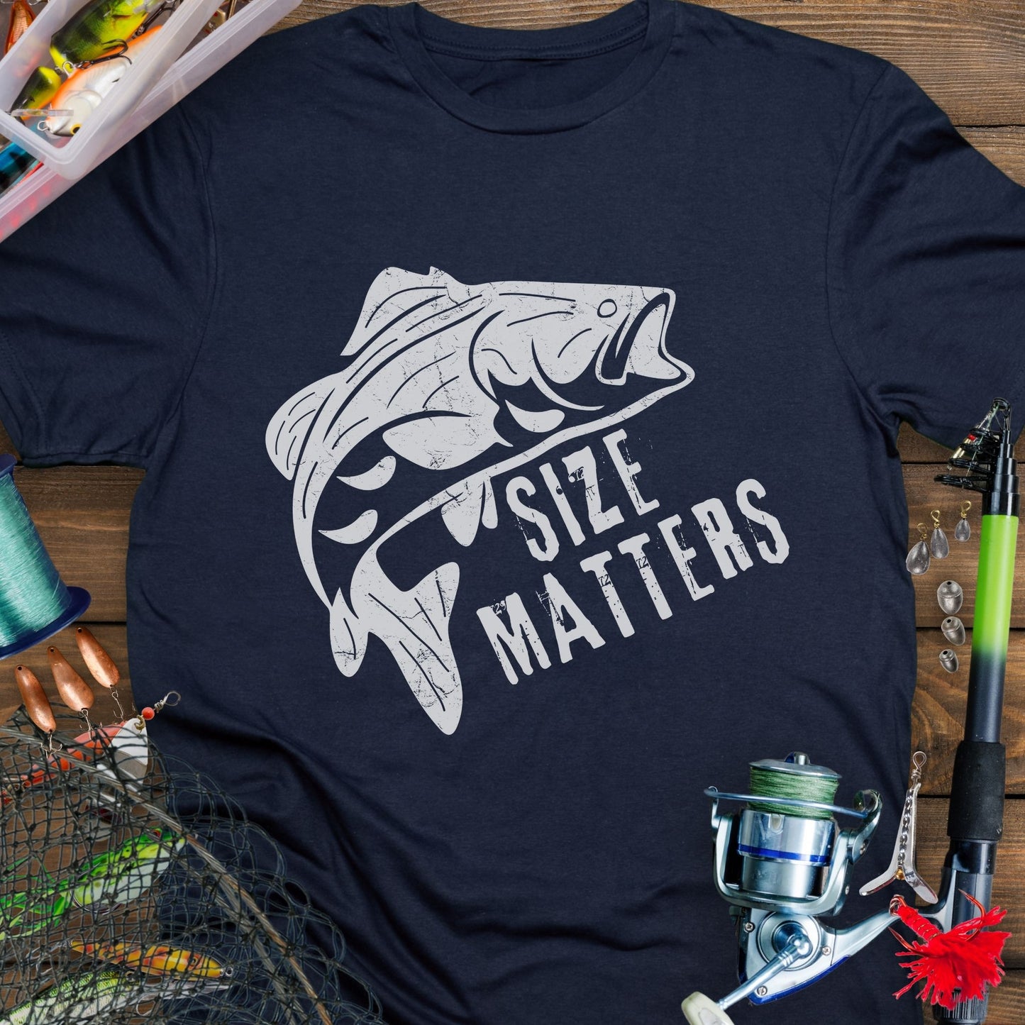 Navy funny fishing T-shirt with a fish and bold "Size Matters" text.