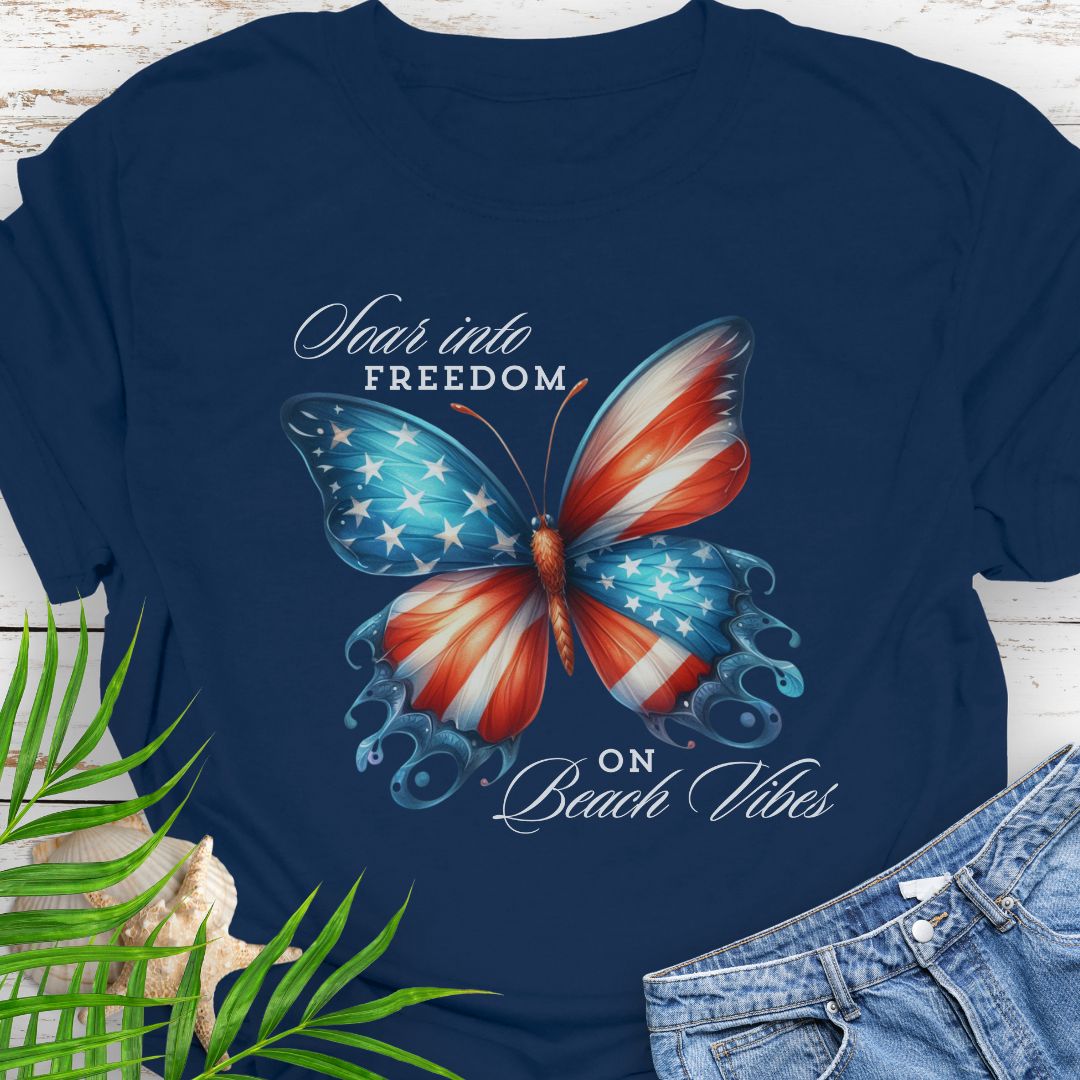 Navy American flag butterfly T-shirt with “Soaring into Freedom” slogan, made of 100% ring-spun cotton, classic fit with crew neckline, perfect for patriotic holidays.