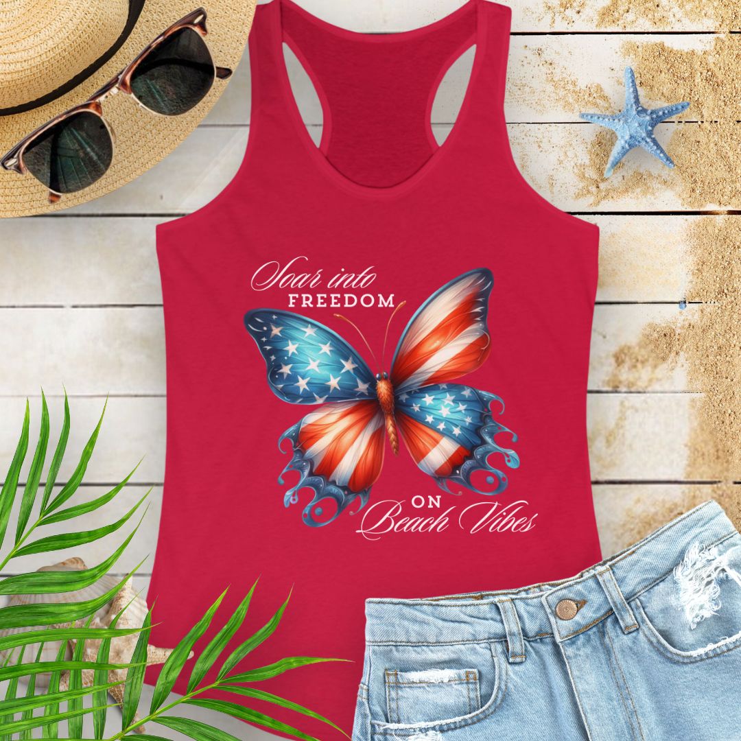 Red patriotic women’s tank top with a American flag butterfly design and “Soaring into Freedom” slogan, featuring a scooped neckline and tear-away label.