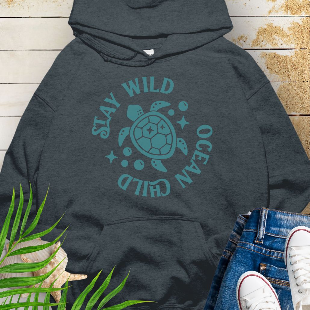 Dark heather sea turtle lover hoodie with ocean-inspired Stay Wild Ocean Child phrase around a sea turtle.