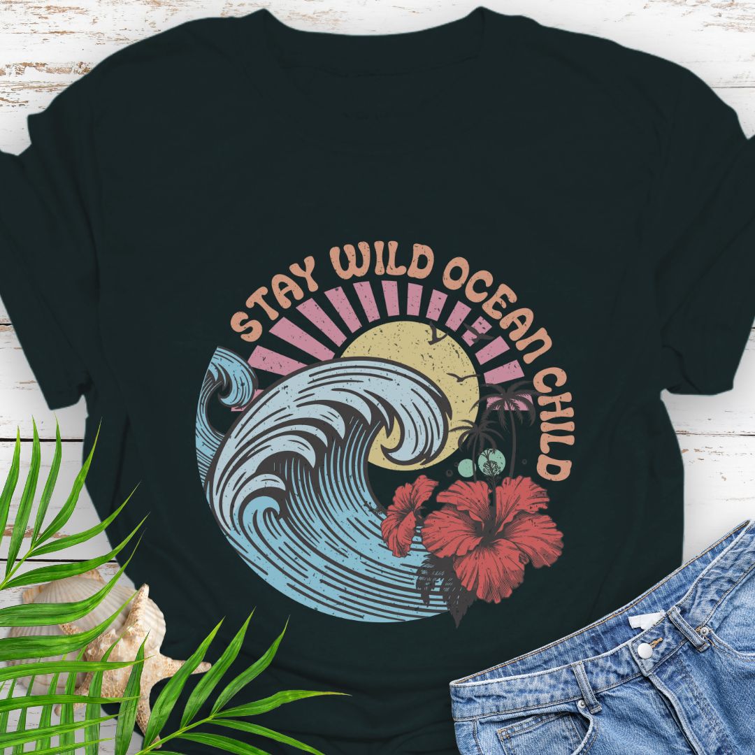 Black  circular beach design with ocean wave, sun, and hibiscus flower and the phrase “Stay Wild Ocean Child”.