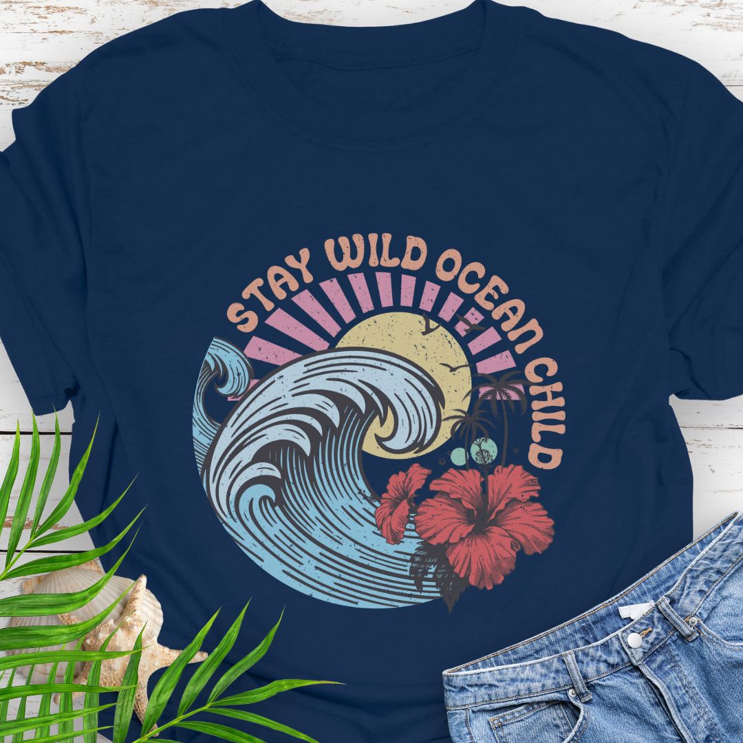 Navy circular beach design with ocean wave, sun, and hibiscus flower and the phrase “Stay Wild Ocean Child”.