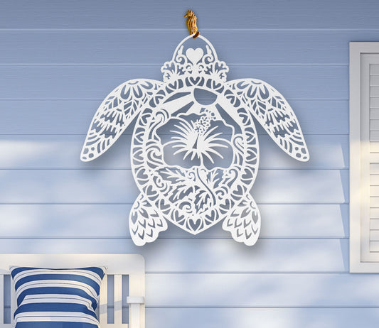 White Metal wall art of a sea turtle silhouette with detailed cutouts and a hibiscus flower in the center, available in various sizes and colors.