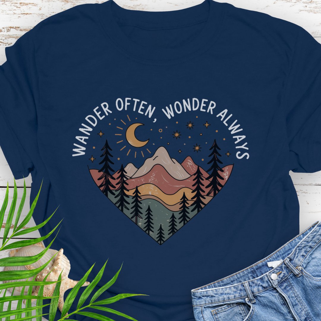 Navy blue Unisex t-shirt with mountain and trees in a heart shape and the phrase "Wander Often, Wonder Always".