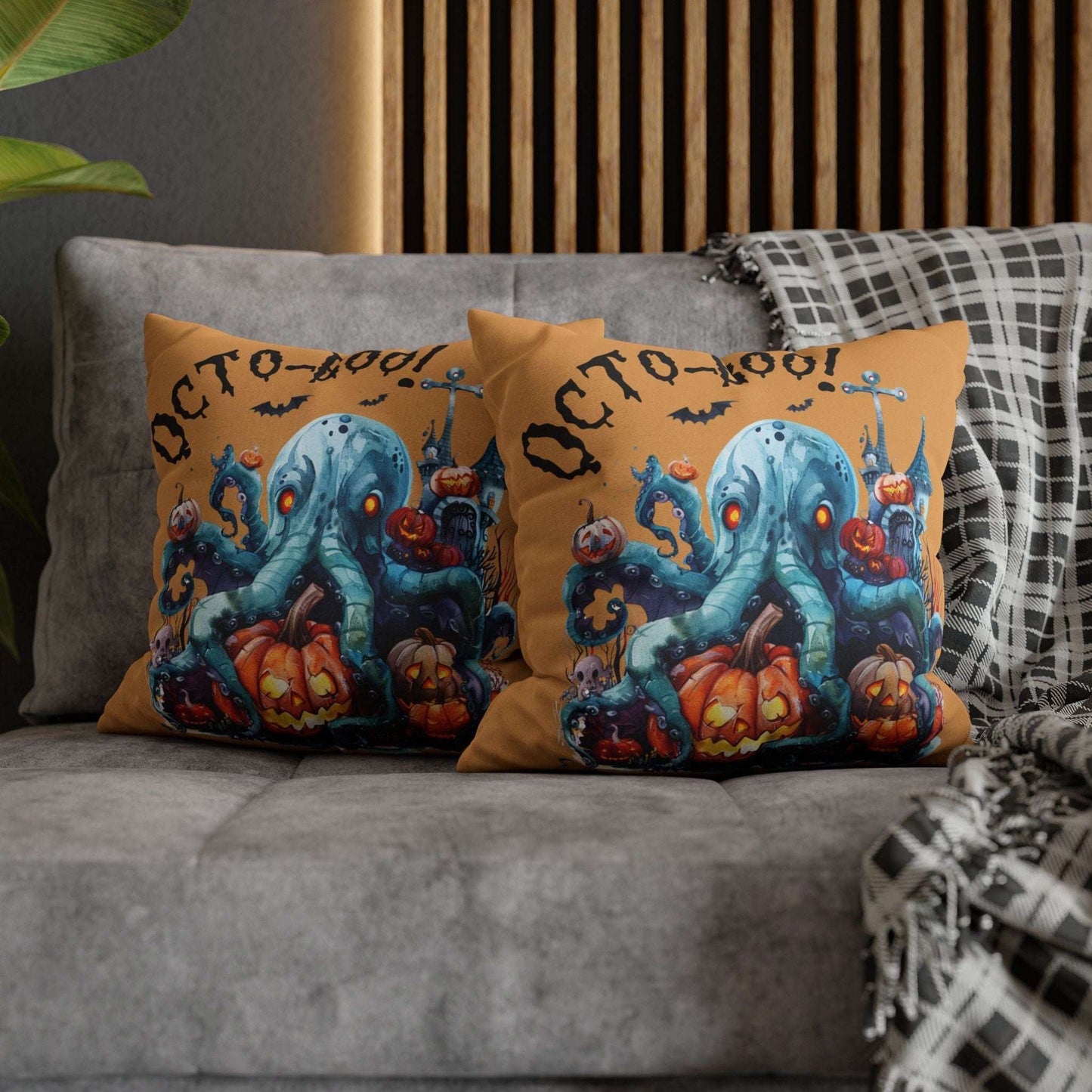 Halloween-themed double-sided decorative pillowcases with octopus and pumpkins that says Octo-Boo!