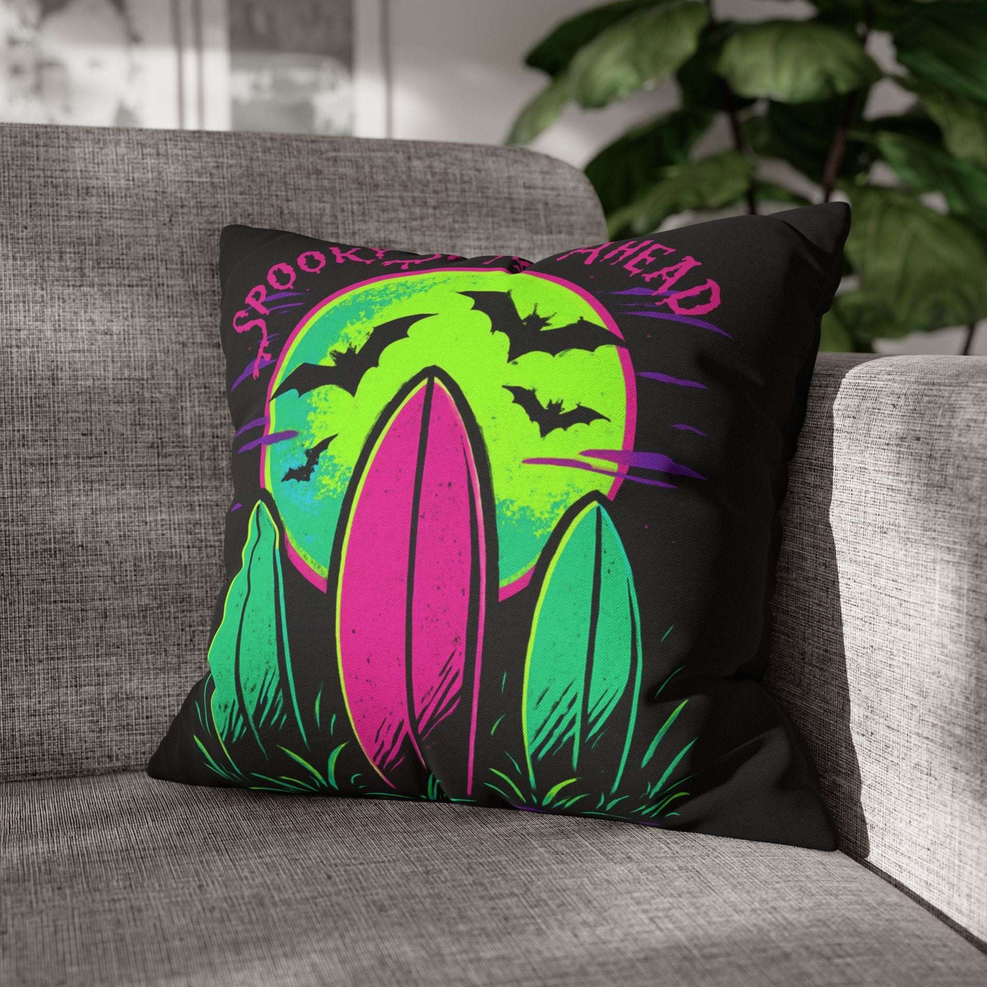 Decorative pillow with a colorful design on a gray couch