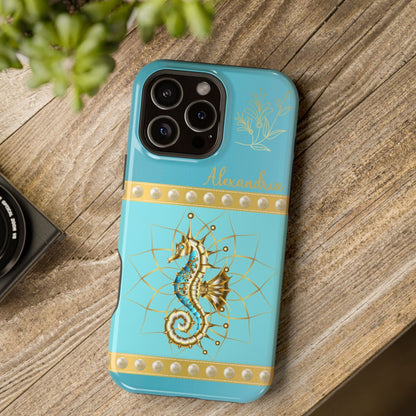 Turquoise Blue phone case with gold seahorse design on a wooden surface