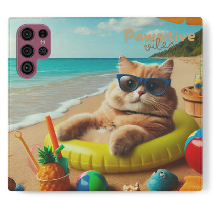 Opened phone case wallet with picture of cat lounging on beach with pool toys and drinks surrounding the cat with the text Pawitive Vibes.