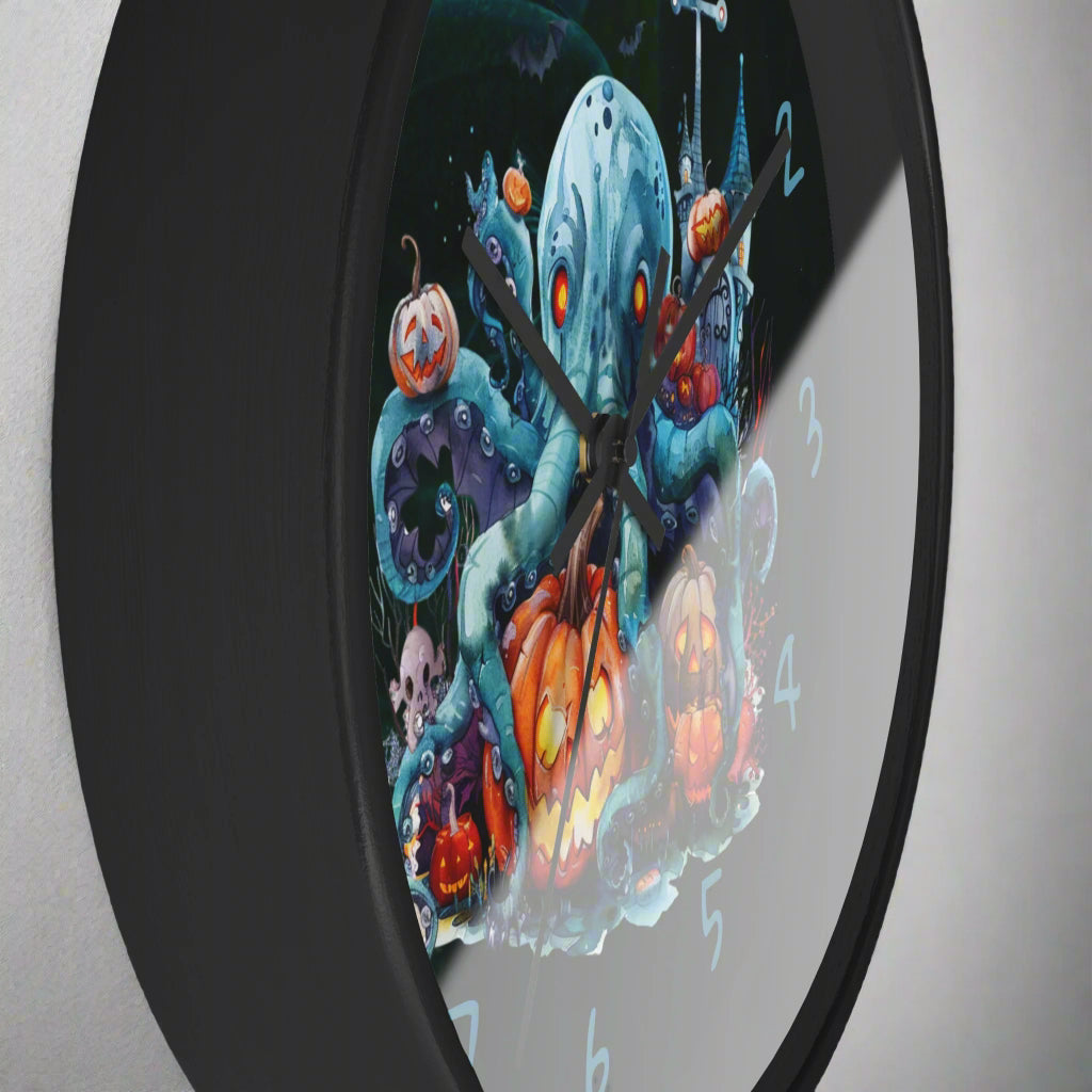 Decorative clock with a Halloween-themed design featuring pumpkins and an octopus.