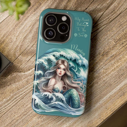 Phone case with mermaid design on a wooden surface