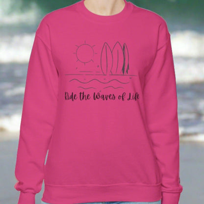 Heliconia crewneck sweatshirt with waves, surfboards and sun with the words Ride the Waves of Life