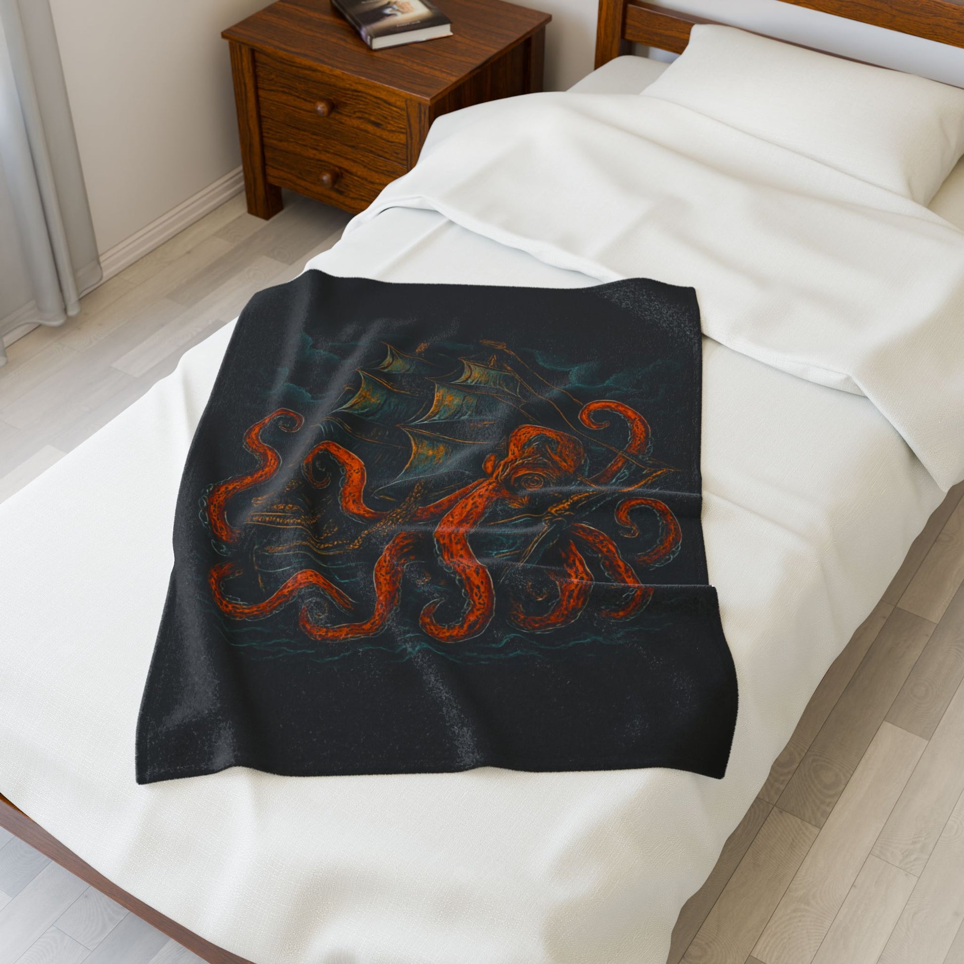 30" x 40" Black velveteen blanket with an octopus enveloping a pirate ship with stormy clouds in the background.