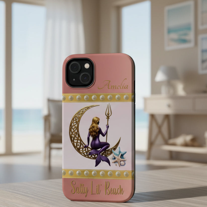 Phone case with mermaid design on a pink background
