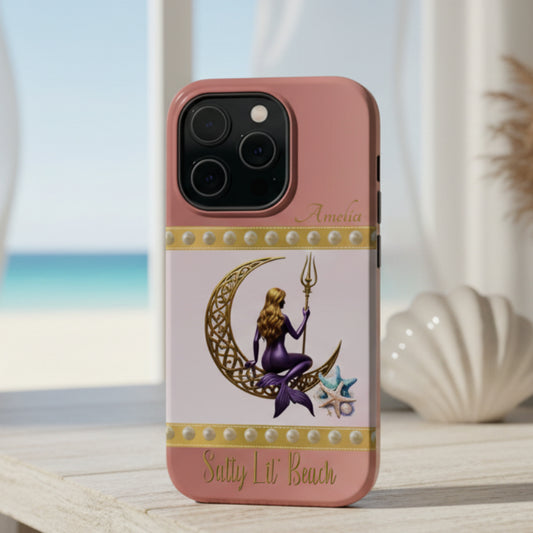 Phone case with mermaid design on a pink background