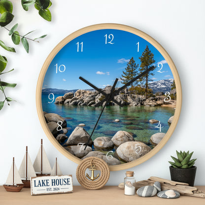 Wall clock with scenic design of a lake and mountains on a blue background