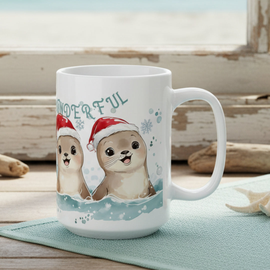 White mug with cartoon seals wearing Santa hats and the word 'Wonderful' on a white background