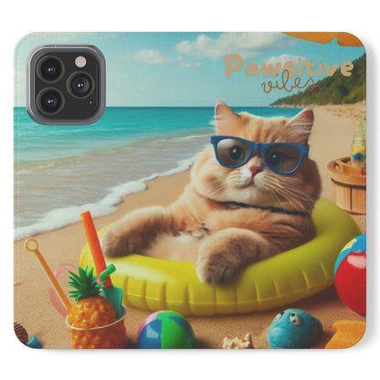 Opened phone case wallet with picture of cat lounging on beach with pool toys and drinks surrounding the cat with the text Pawitive Vibes.