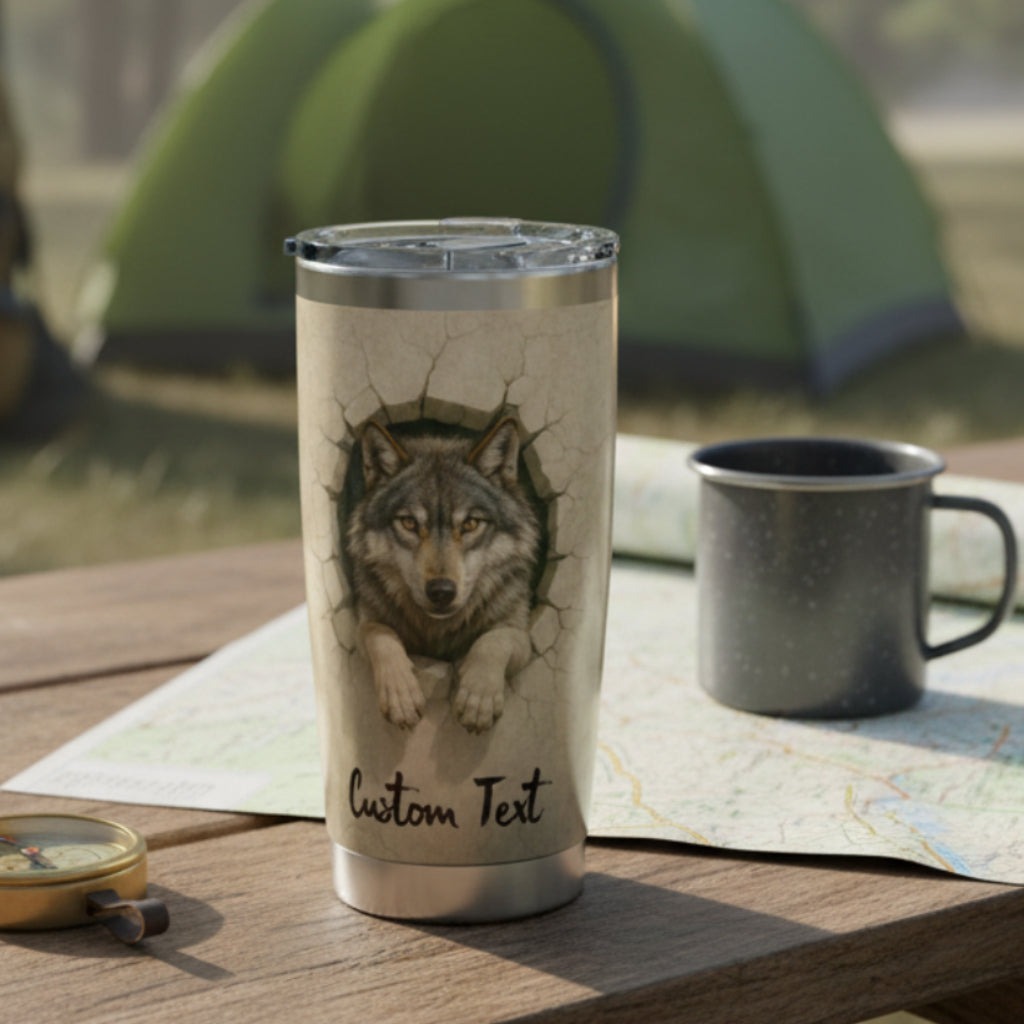 Tumbler with a wolf design breaking out of wall on both sides.