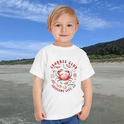 White Toddler t-shirt with the phrase “Crabbie Club Crescent City, CA” and a playful cartoon crab graphic.