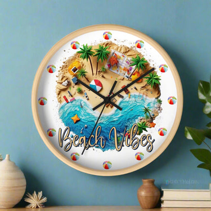 A round wall clock with wood frame and black hands with a beach scene that says Beach Vibes and has beach balls in place of the numbers to show the time.