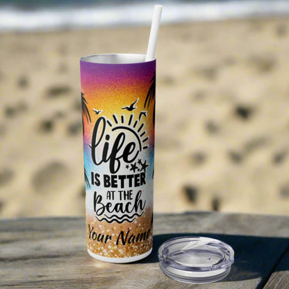 skinny 20 oz tumbler with vibrant design of beach with text life is better at the beach