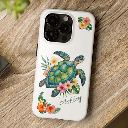 iPhone 15 case with a white background and a sea turtle with hibiscus flowers, with more hibiscus flowers around the sides.