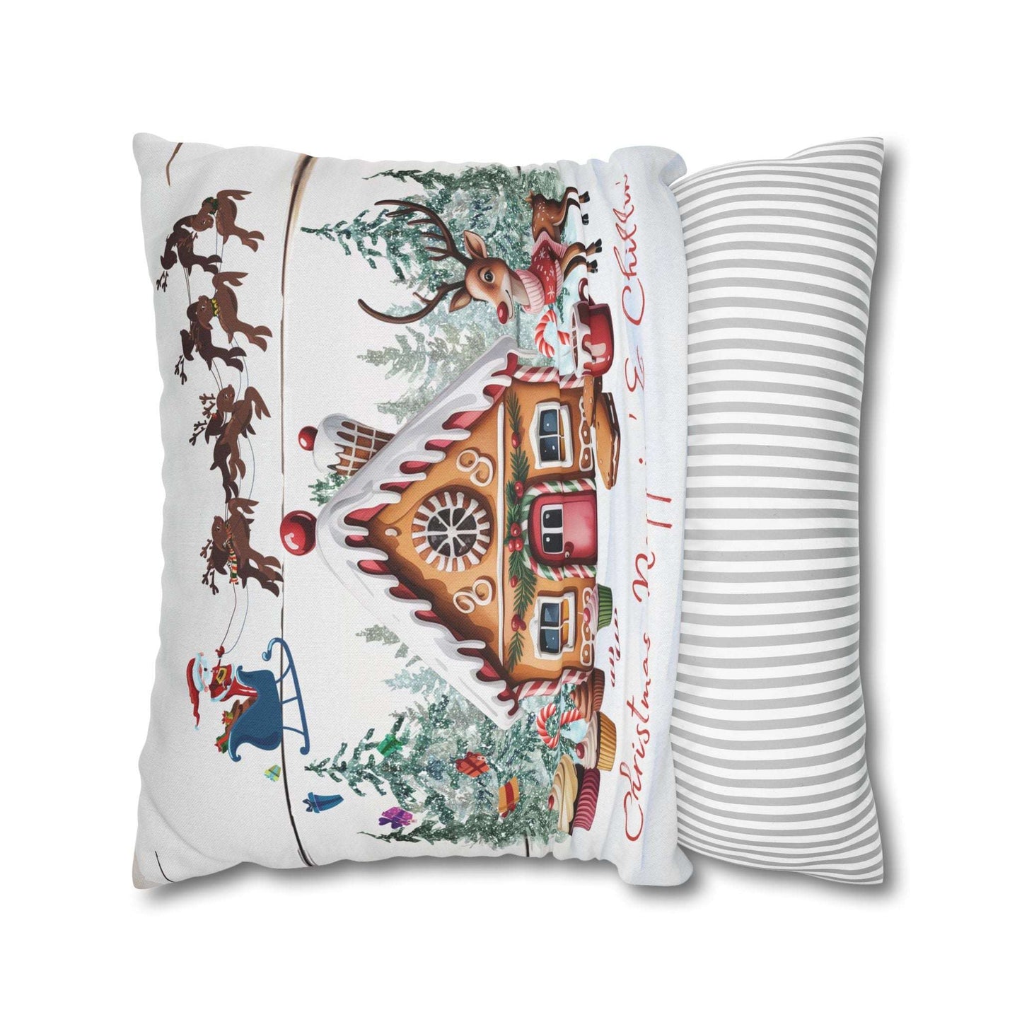 Decorative pillow with Christmas-themed design featuring a cuckoo clock and striped pillow next to it on a white background.