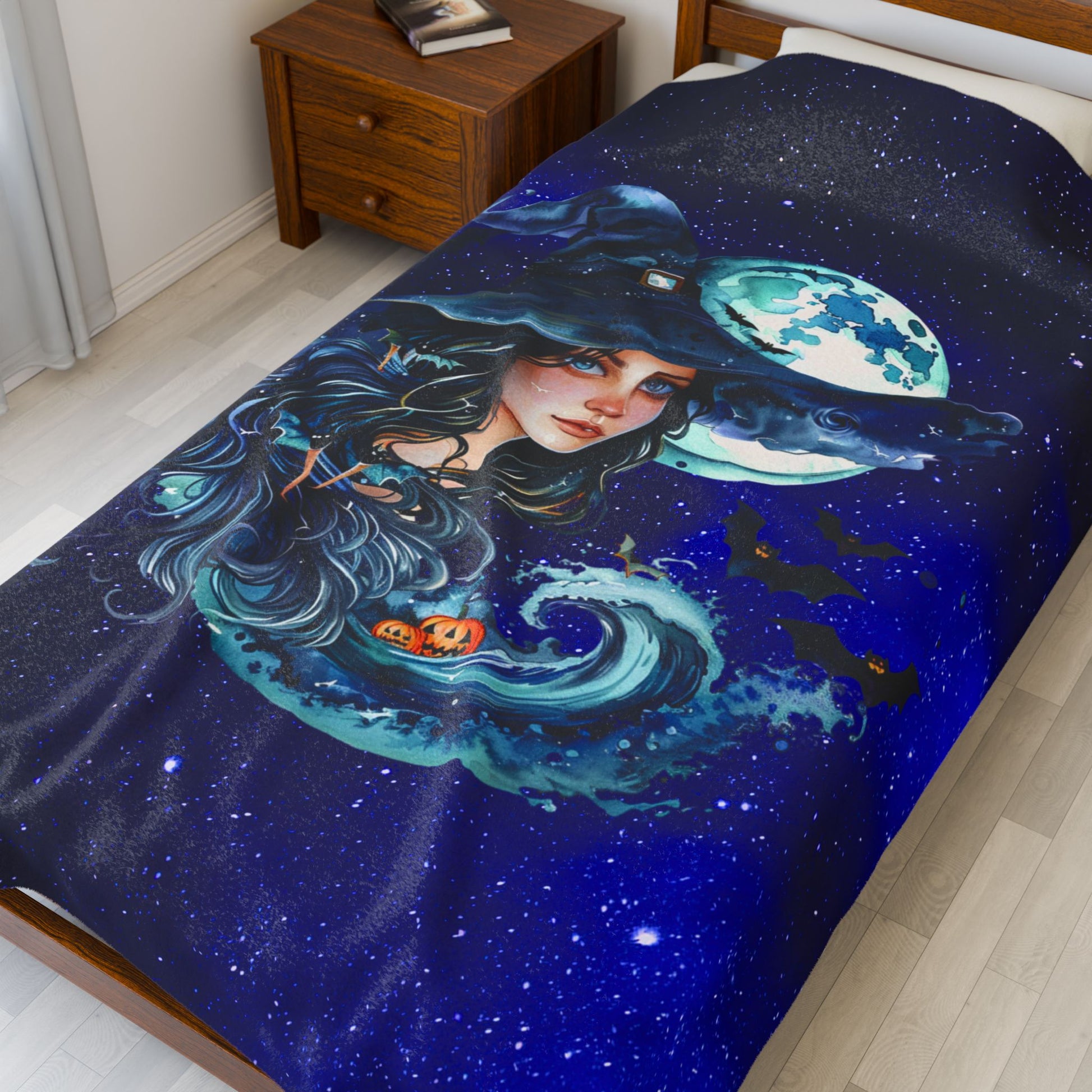Halloween plush 60" x 80" blanket with witch, ocean wave, pumpkins, and full moon in starry sky.